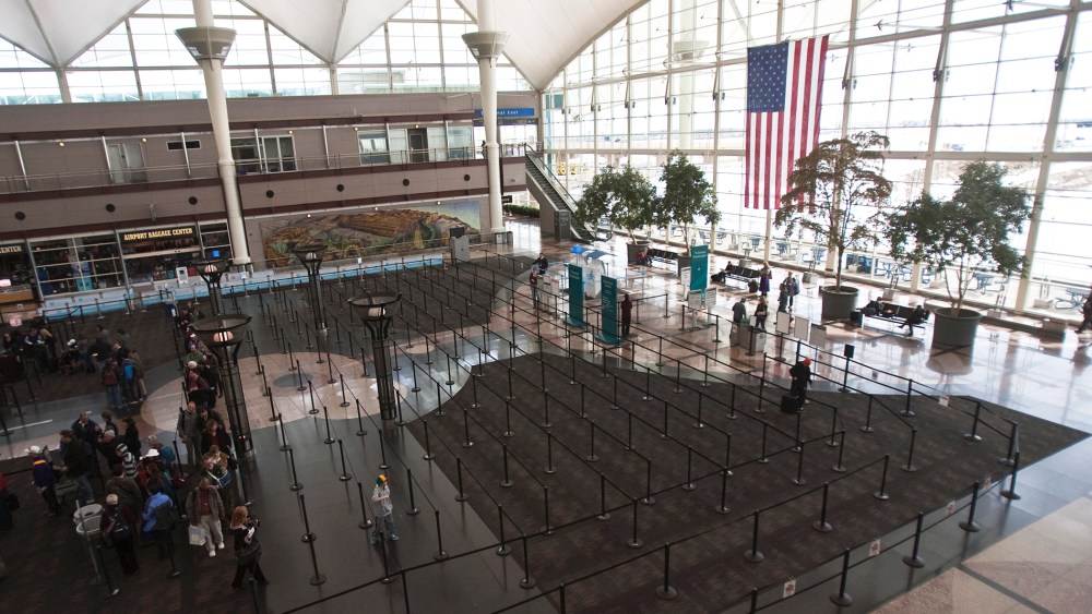 Passengers wait in security lines at the Denver International Airport in Denver, Colo. (Photo by Nathan Armes/Reuters)