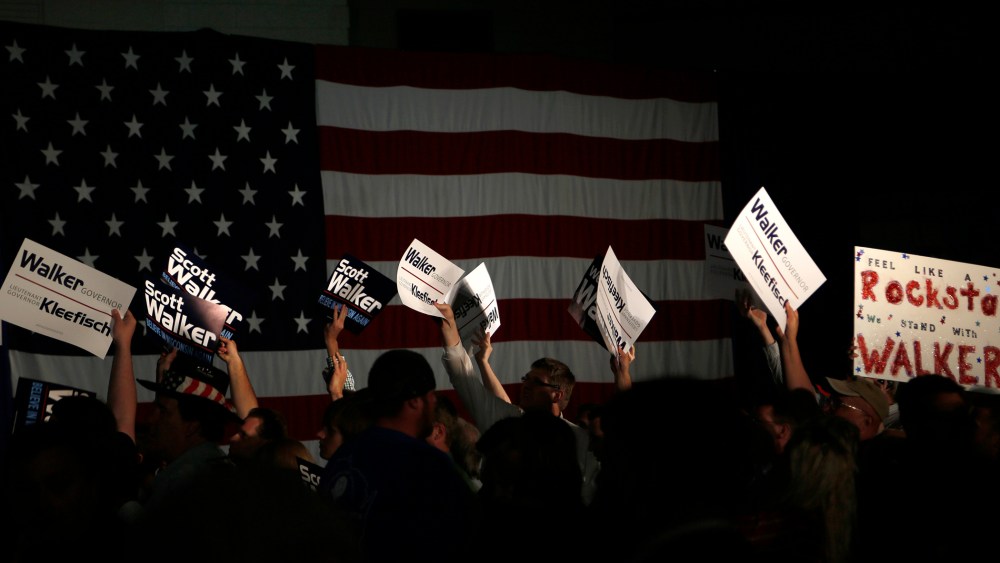 Supporters cheer during an election night rally for Republican Wisconsin Governor Walker in Waukesha