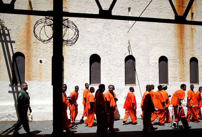 Inmates walk in San Quentin state prison in San Quentin, California June 8, 2012.  (Photo by Lucy Nicholson/Reuters)