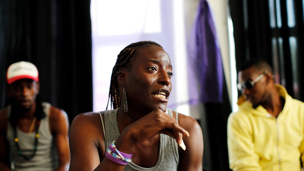 Inkera Jordan, who is HIV positive since 1995 and a peer educator with the AIDS Service Center of New York City socializes with members of the group Sexy with A Goal (SWAG) at ASC/NYC's Lower East Side Peer Outreach Center, July 7, 2012 in New York.