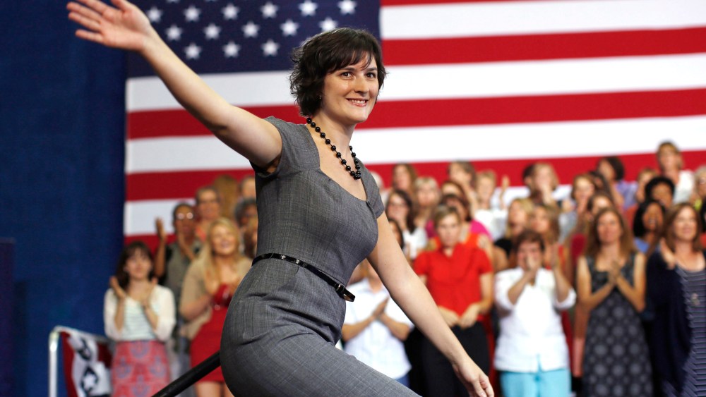 Sandra Fluke steps on stage to introduce President Barack Obama during an election campaign rally at the Auraria Event Center in Denver, Colorado, Aug. 8, 2012.