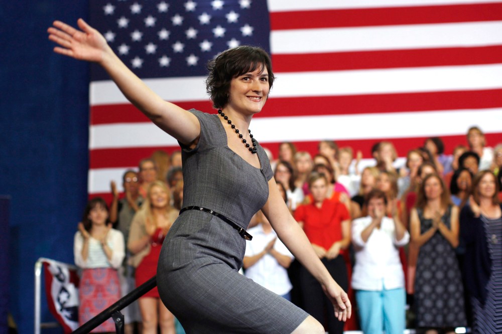 Sandra Fluke steps on stage to introduce President Barack Obama during an election campaign rally at the Auraria Event Center in Denver, Colorado, Aug. 8, 2012.