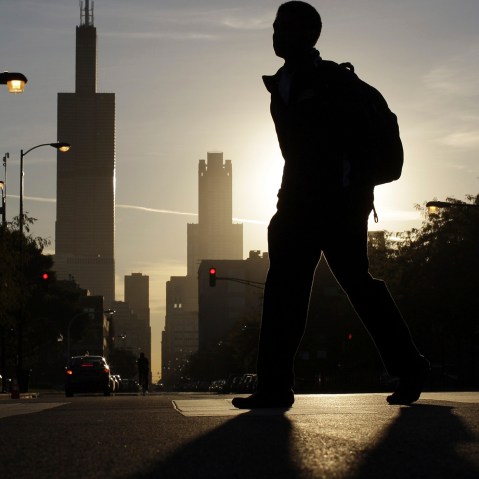 A student makes his way to class at Whitney Young High School in Chicago, on Sept. 19, 2012.