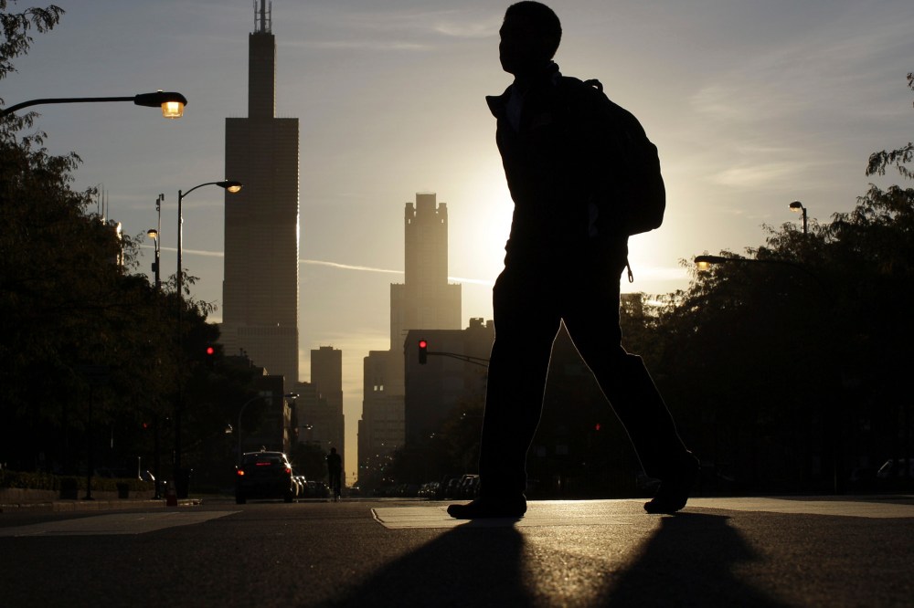 A student makes his way to class at Whitney Young High School in Chicago, on Sept. 19, 2012.