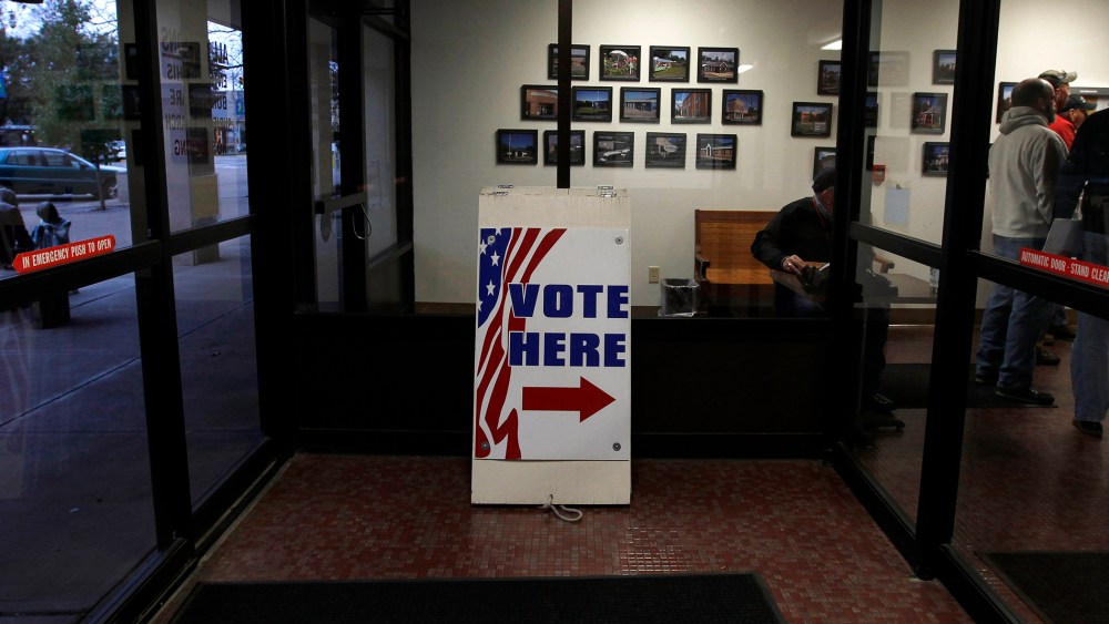 Signs direct voters to the Licking County Board of Elections to open in Newark, Ohio on Nov. 3, 2012. (Photo by Matt Sullivan/Reuters)