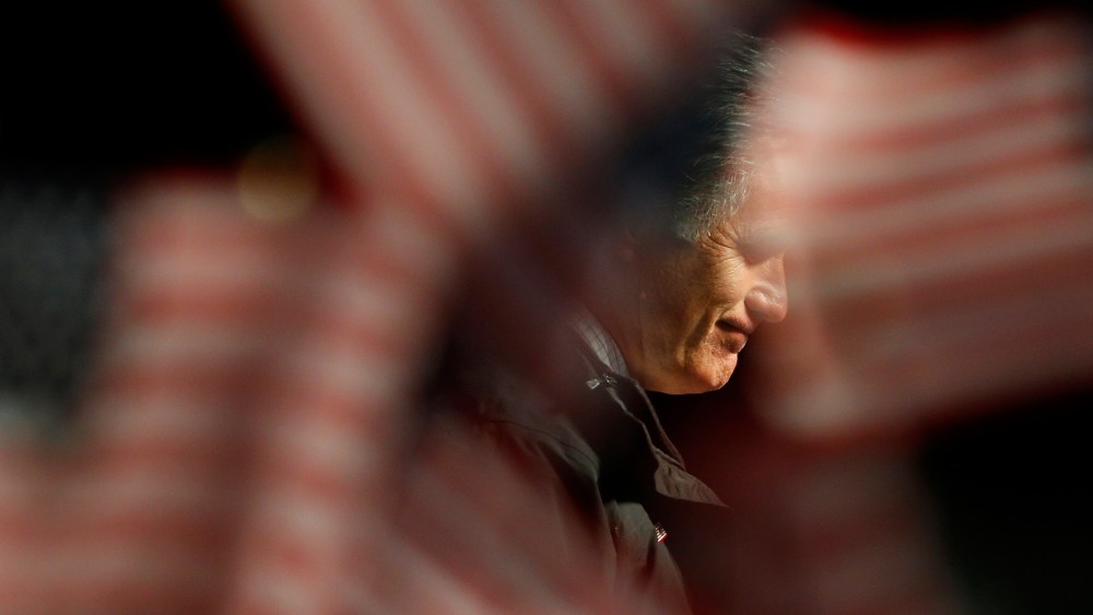 Former Republican presidential nominee Mitt Romney pauses while speaking at a campaign rally in Newport News, Va., Nov. 4, 2012.