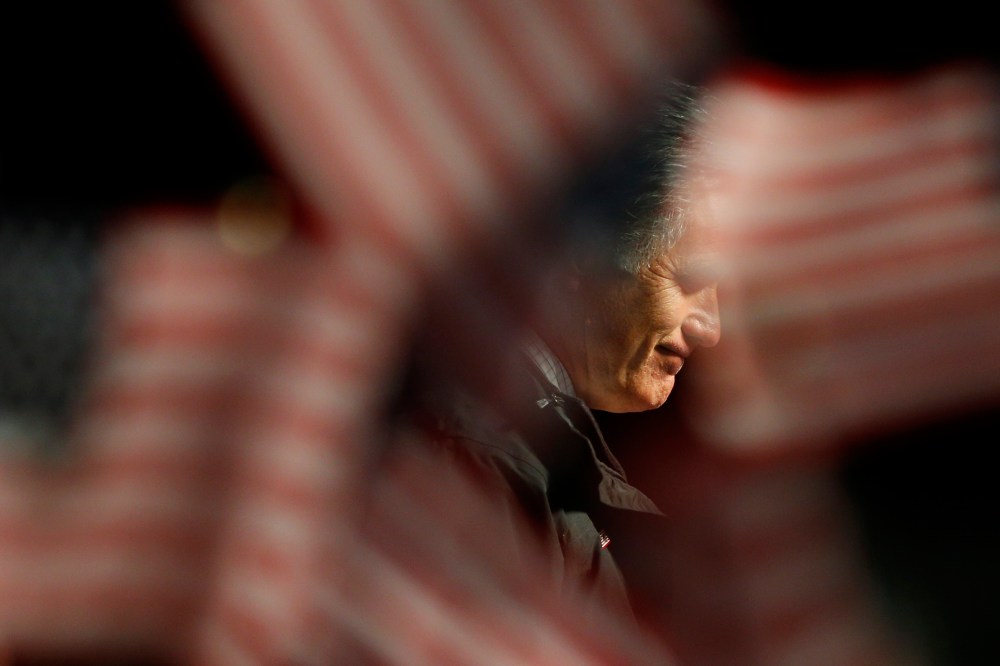 Former Republican presidential nominee Mitt Romney pauses while speaking at a campaign rally in Newport News, Va., Nov. 4, 2012.