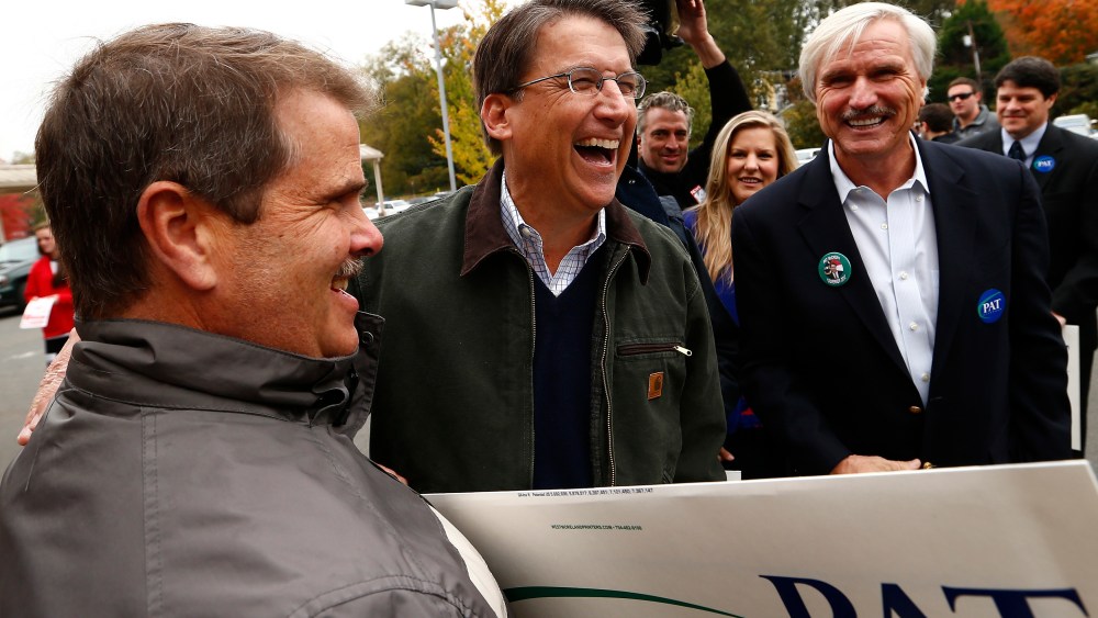 North Carolina Governor Pat McCrory meets supporters outside Myers Park Traditional Elementary school during the U.S. presidential election in Charlotte, NC on Nov. 6, 2012.