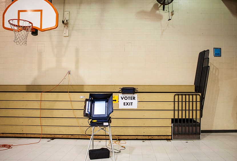 A voting booth awaits voters at the Dr. Martin Luther King Community Center on the morning of U.S. presidential election in Racine, Wisconsin November 6, 2012. (Photo by Sara Stathas/Reuters)