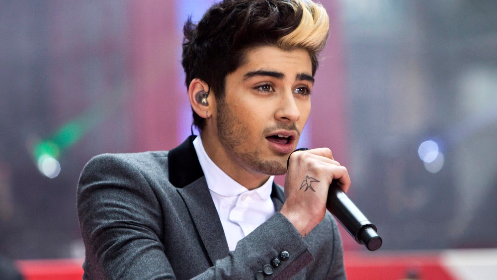 Zayn Malik performs with his band "One Direction" on NBC's Today show in New York on Nov. 13, 2012. (Photo by Andrew Burton/Reuters)