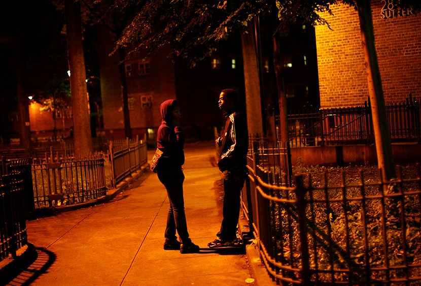 People are seen at a housing project in Brownsville, New York June 5, 2012. (Photo by Eric Thayer/Reuters)
