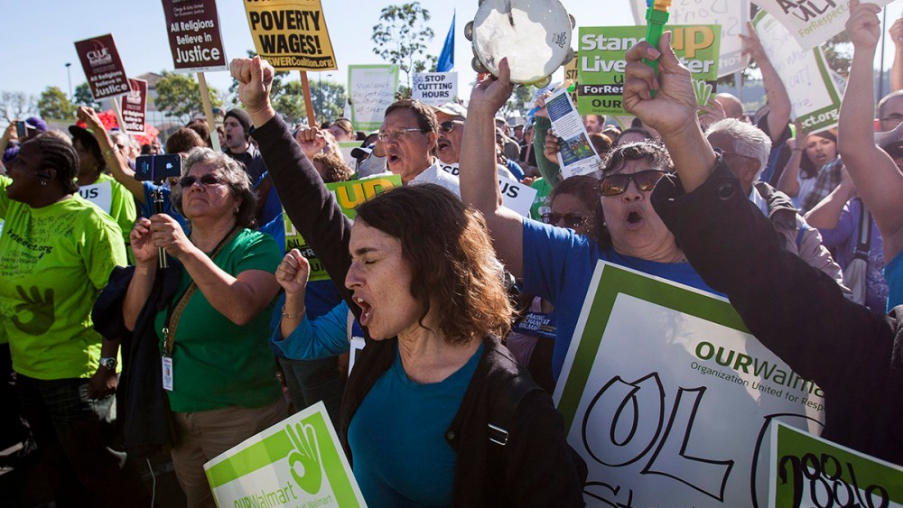 Striking Walmart workers and supporters protest at a store on Black Friday in Paramont, California