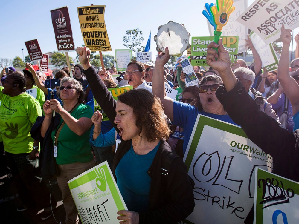 Striking Walmart workers and supporters protest at a store on Black Friday in Paramont, California