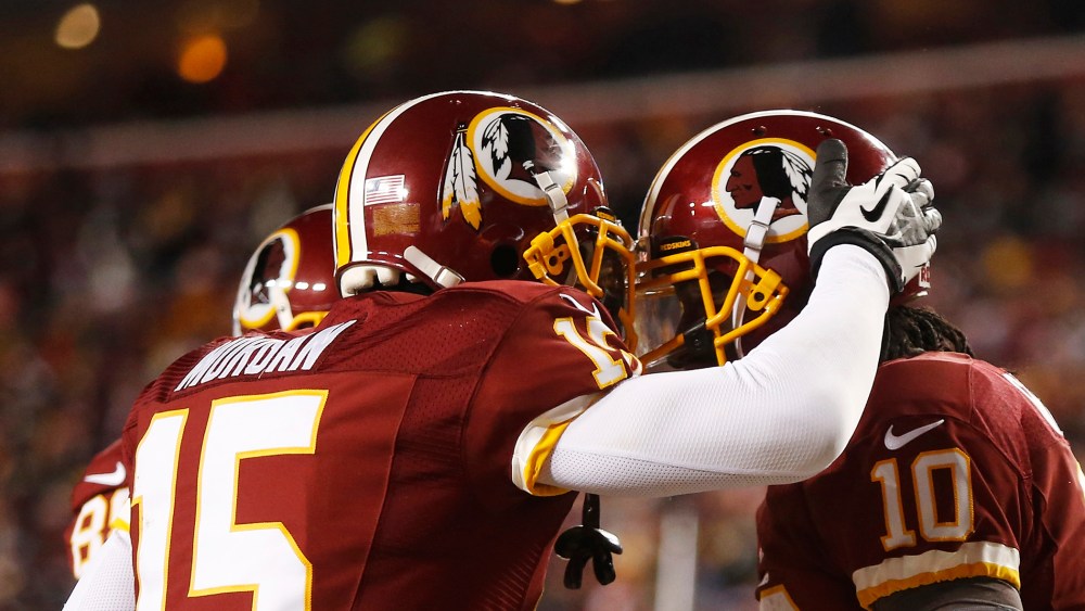 Players on the Washington Redskins celebrate after scoring a touchdown during the second half of a NFL football game in Landover, Md., on Dec. 30, 2012. (Photo by Jonathan Ernst/Reuters)