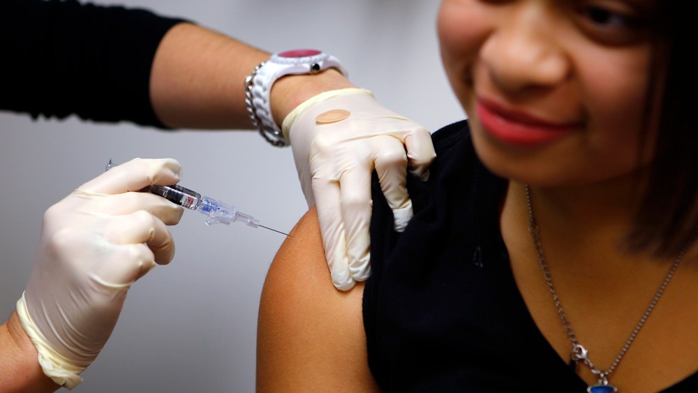 Jasmine Rodriguez, 10, gets an influenza vaccine at Boston Children's Hospital in Boston, Mass. on Jan. 10, 2013.