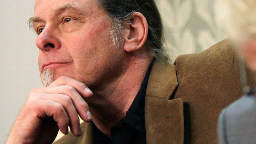 Musician Ted Nugent (L) listens to U.S. President Barack Obama's State of the Union Speech on Capitol Hill in Washington, Feb. 12, 2013.