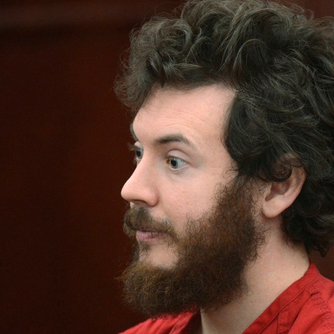 Accused Aurora theater gunman James Holmes listens during his arraignment in Centennial, Colo., March 12, 2013. (Photo by R.J. Sangosti/Reuters)