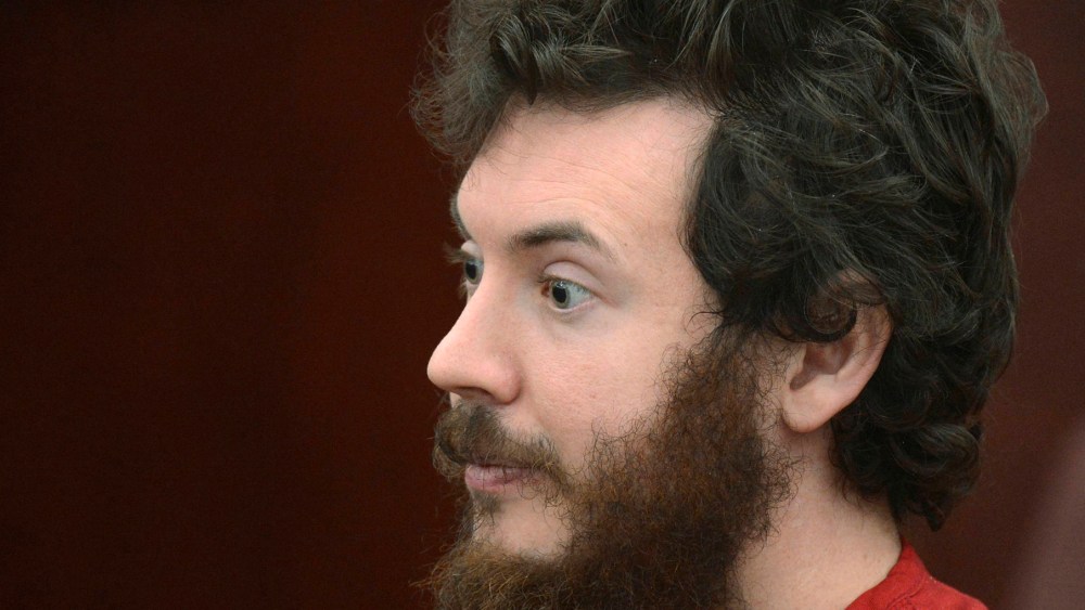 Accused Aurora theater gunman James Holmes listens during his arraignment in Centennial, Colo., March 12, 2013. (Photo by R.J. Sangosti/Reuters)