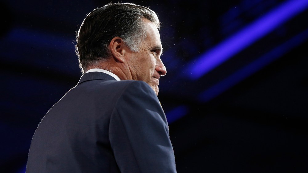 Former U.S. presidential candidate Mitt Romney takes the stage at CPAC in National Harbor, Maryland, March 15, 2013.