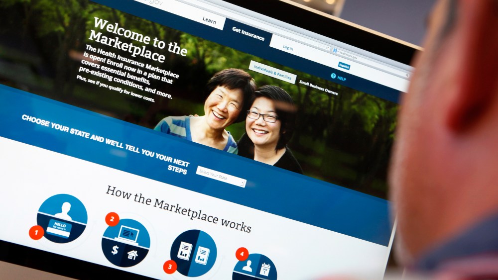 A man looks over the Affordable Care Act (commonly known as Obamacare) signup page on the HealthCare.gov website in New York in this October 2, 2013 photo illustration.