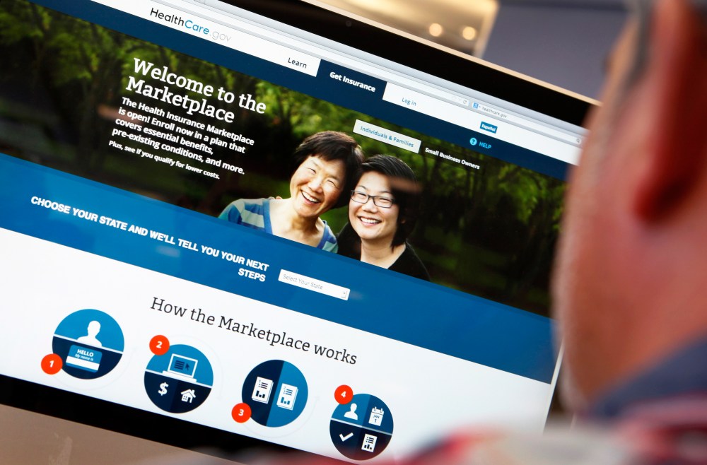 A man looks over the Affordable Care Act (commonly known as Obamacare) signup page on the HealthCare.gov website in New York in this October 2, 2013 photo illustration.
