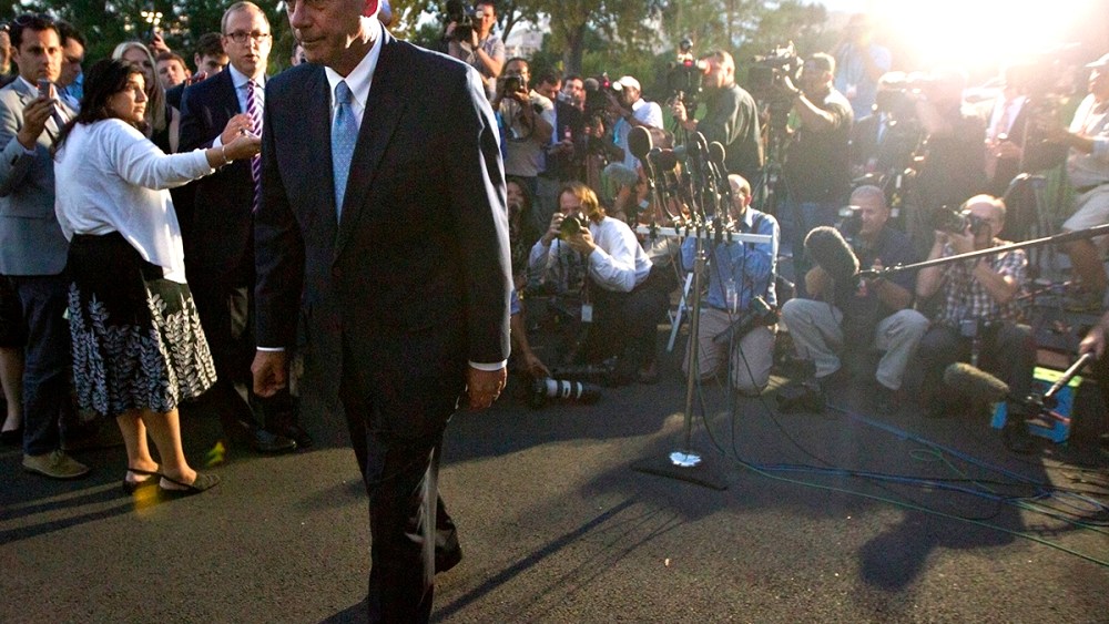 U.S. House Speaker Boehner leaves after a meeting with U.S. President Obama, outside the West Wing of the White House in Washington