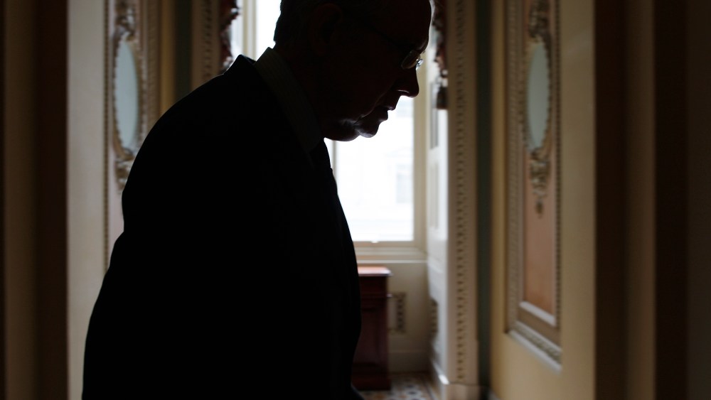 U.S. Senate Majority Leader Harry Reid returns to his office after a news conference at the U.S. Capitol in Washington on Oct. 3, 2013.