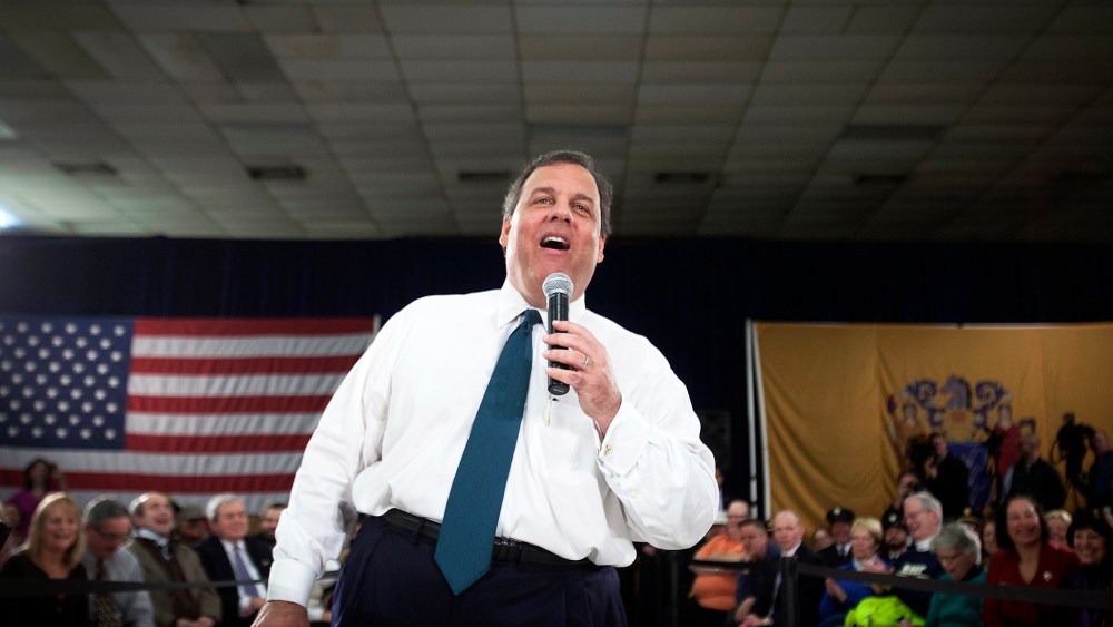 Chris Christie laughs as he takes a question during a town hall meeting in Sterling, N.J., Feb. 26, 2014.