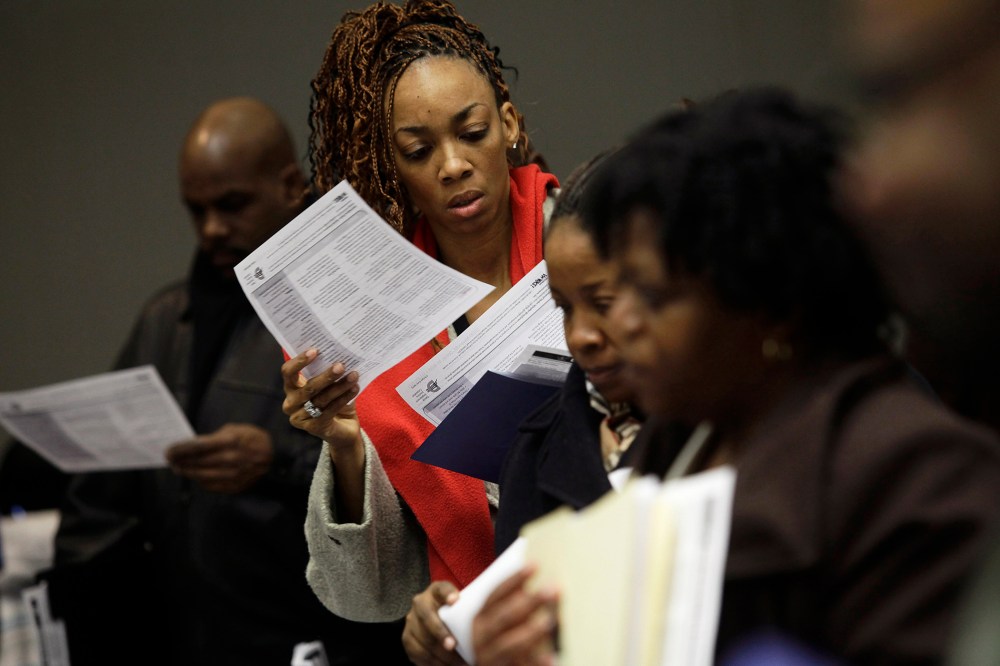 People attend a job fair in Detroit, Michigan, Mar. 1, 2014.