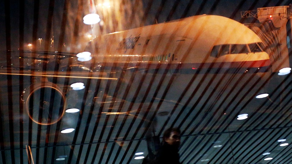 Malaysia Airlines Boeing 777-200ER flight MH318 to Beijing sits on the tarmac at the boarding gate at Kuala Lumpur International Airport at approximately on March 17, 2014.