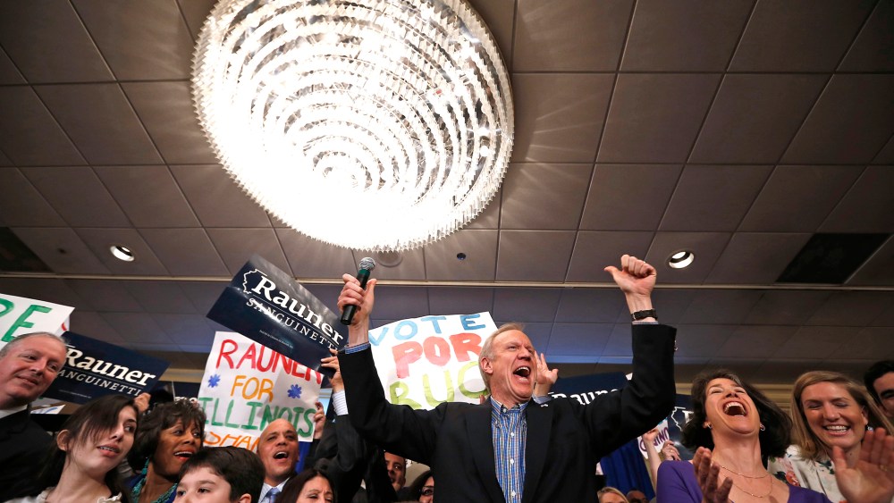 Republican candidate for Illinois Governor Bruce Rauner celebrates with supporters after winning the nomination in the Illinois Primary in Chicago, March 18, 2014.
