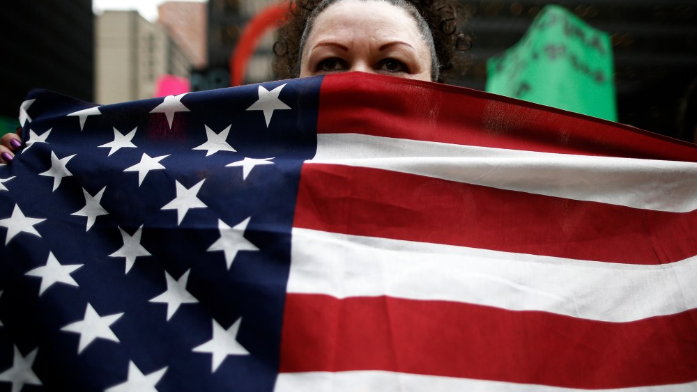 A protester takes part in a demonstration calling for immigration reform at a rally in Chicago, Ill. on March 27, 2014.