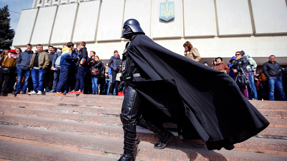 "Darth Vader", the leader of the Internet Party of Ukraine, walks during a rally in front of the Ukrainian Central Elections Commission in Kiev April 3, 2014. (Photo by Shamil Zhumatov/Reuters)
