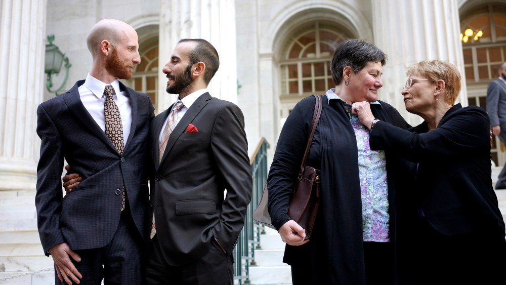 Plaintiffs talk outside the courthouse after a federal appeals court heard oral arguments on a Utah state law forbidding gays and lesbians from marrying in Denver