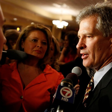 Republican Scott Brown talks to the media after announcing his bid for the United States Senate primary election in Portsmouth, New Hampshire, April 10, 2014.