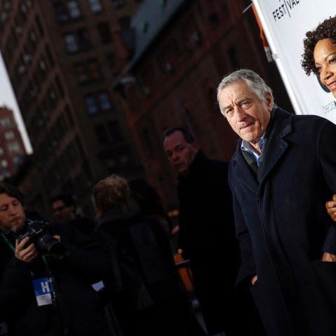 Robert De Niro stands with his wife Grace Hightower upon arriving for the 2014 Tribeca Film Festival opening night screening of 'Time Is Illmatic' in New York, April 16, 2014. (Photo by Shannon Stapleton/Reuters)