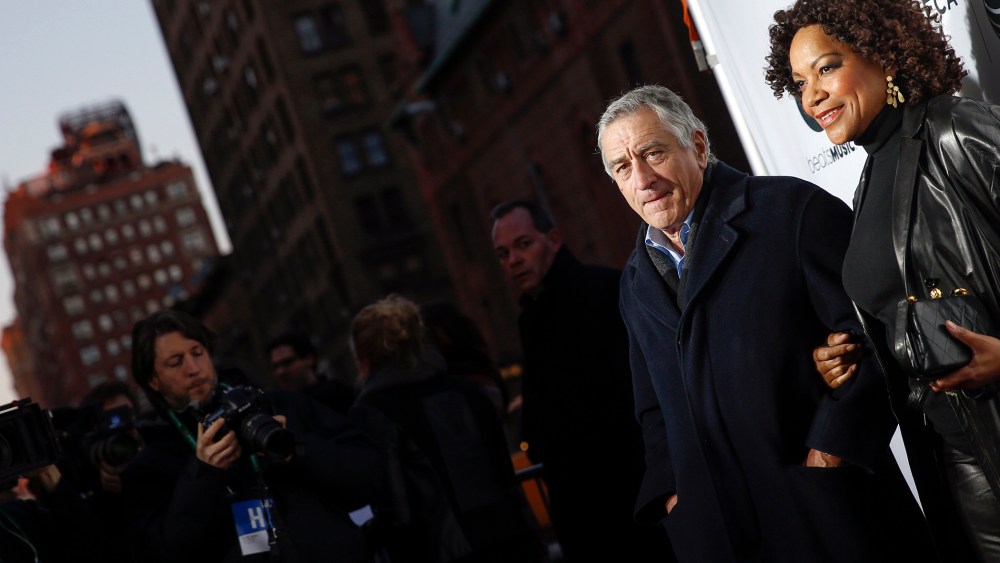 Robert De Niro stands with his wife Grace Hightower upon arriving for the 2014 Tribeca Film Festival opening night screening of 'Time Is Illmatic' in New York, April 16, 2014. (Photo by Shannon Stapleton/Reuters)