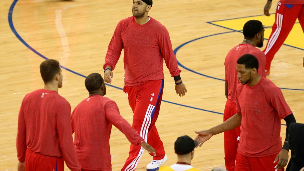 Los Angeles Clippers forward Jared Dudley (9) warms up with teammates wearing their warm up clothes inside-out before game four of the first round of the 2014 NBA Playoffs at Oracle Arena, April 27, 2014, in Oakland, Calif.