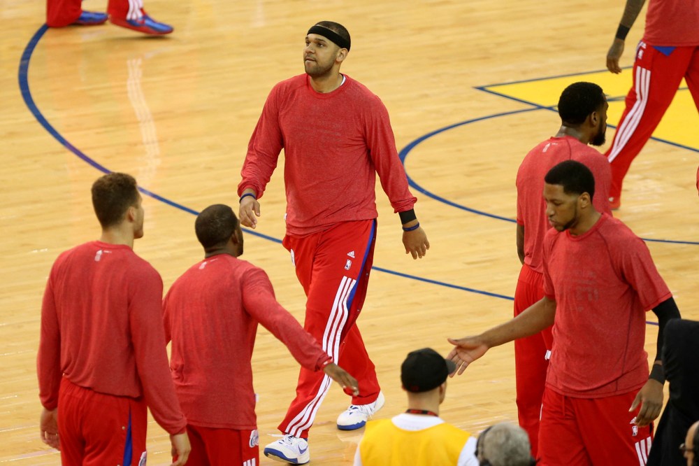 Los Angeles Clippers forward Jared Dudley (9) warms up with teammates wearing their warm up clothes inside-out before game four of the first round of the 2014 NBA Playoffs at Oracle Arena, April 27, 2014, in Oakland, Calif.