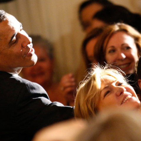 A woman makes a selfie as U.S. President Barack Obama greets guests at a Cinco de Mayo reception at the White House in Washington, May 5, 2014. (Photo by Yuri Gripas/Reuters)