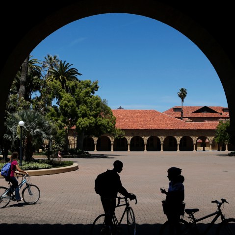 Students retrieve their bicycles after leaving a class, at the Main Quad at Stanford University in Stanford, Calif., May 9, 2014. (Photo by Beck Diefenbach/Reuters)