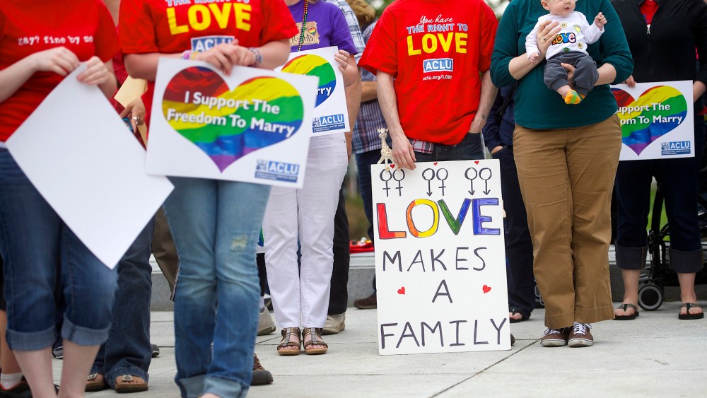 Gay rights supporters hold rally on Pennsylvania State Capital steps after ruling struck down ban on same-sex marriage in Harrisburg