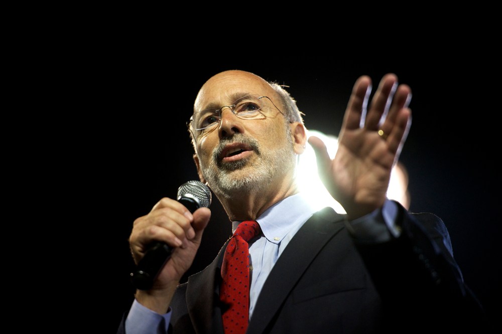 Then, Democratic candidate for Pennsylvania Governor Tom Wolf takes the stage at his primary election night party in Santander Stadium in York, Pa., May 20, 2014. (Photo by Mark Makela/Reuters)