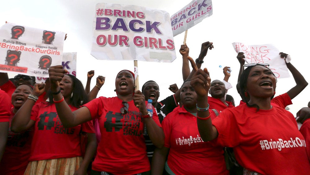 The Abuja wing of the "Bring Back Our Girls" protest group march to the presidential villa in Abuja
