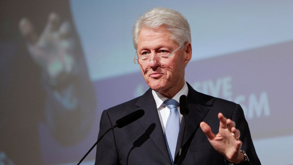 Former U.S. President Bill Clinton gives a keynote address at a conference in London, May 27, 2014.