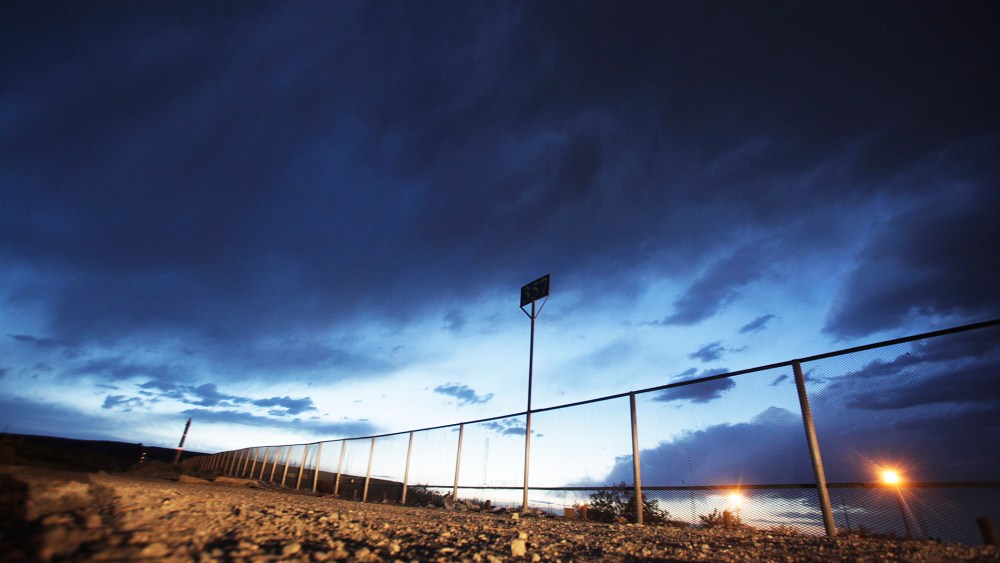 The fence marking the border between Mexico and the U.S. is seen in the Anapra neighborhood of Ciudad Juarez, May 23, 2014.