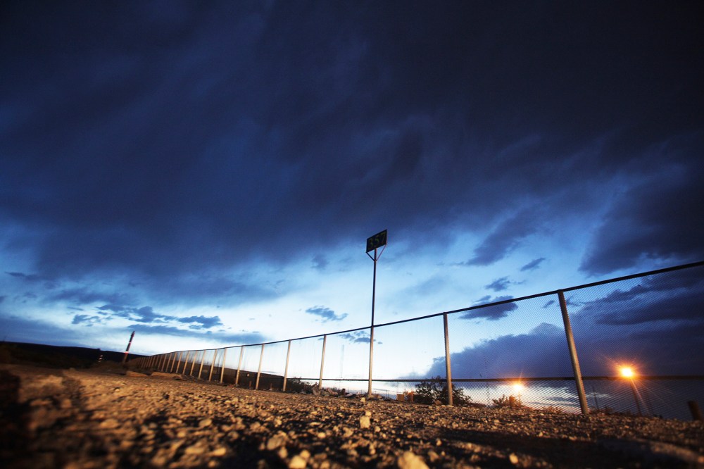 The fence marking the border between Mexico and the U.S. is seen in the Anapra neighborhood of Ciudad Juarez, May 23, 2014.
