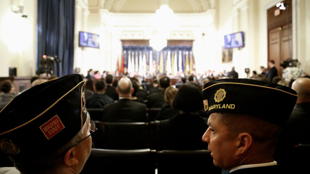U.S. military veterans listen in the audience during a House Veterans' Affairs Committee hearing on the Phoenix VA Health Care System wait list, on Capitol Hill in Washington