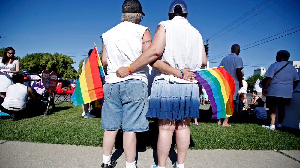 Skinner and her wife Belka wait for the beginning of the Utah Pride Parade in Salt Lake City