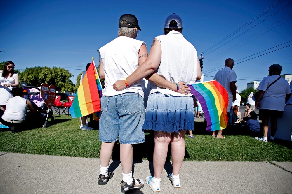 Skinner and her wife Belka wait for the beginning of the Utah Pride Parade in Salt Lake City